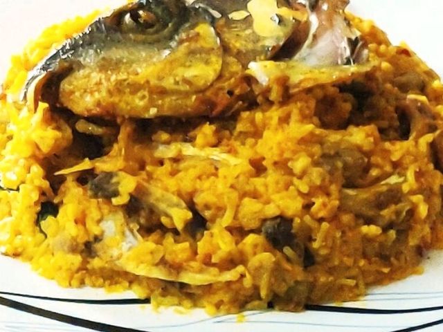 Khichuri with fish head